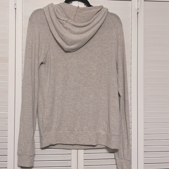 Tan hoodie by garage - Picture 4 of 4